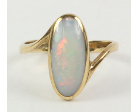 Modernist hallmarked 9ct gold ring set with an oval opal   Condition Report   Click here for further images, condition, aucti