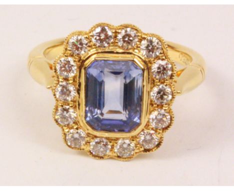 Sapphire and diamond cluster gold ring hallmarked 18ct (sapphire approx 1.8 carat) Condition Report Click here for further im