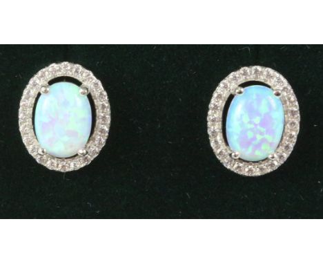 Pair of halo set opal dress ear-rings stamped 925 Condition Report Click here for further images, condition, auction times & 