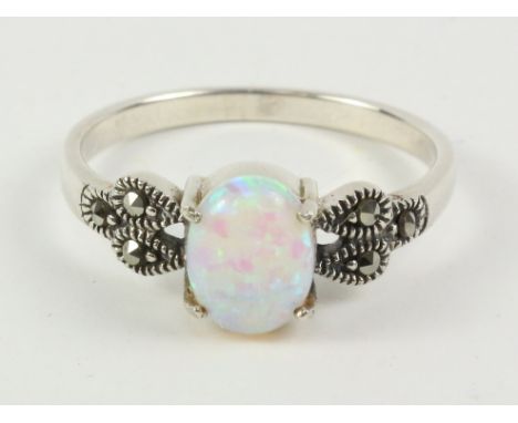 Opal and marcasite ring stamped 925   Condition Report   Click here for further images, condition, auction times & delivery c