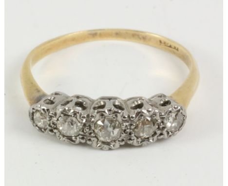 Five stone diamond ring stamped 18ct   Condition Report   Click here for further images, condition, auction times & delivery 