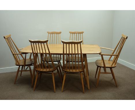 Ercol 'Windsor' light elm finish rectangularly dining table (153ccm x 76cm, H72cm), and six Ercol stick back dining chairs   