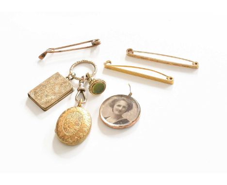 A Quantity of Jewellery, comprising of three tie pins, a locket with a 9 carat gold frame, and a split ring suspending two lo