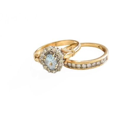 A 9 Carat Gold Aquamarine and Diamond Cluster Ring, finger size R; and A 9 Carat Gold Diamond Half Hoop Ring, finger size RGr