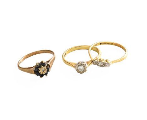 An 18 Carat Gold Diamond Solitaire Ring, finger size O; A 9 Carat Gold Sapphire and Diamond Cluster Ring, finger size P1/2 (a