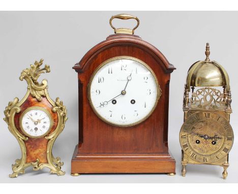 A French Gilt Metal Mounted Mantel Timepiece,28cm high, circa 1890; a lantern type striking mantel clock, 33cm, 20th century;