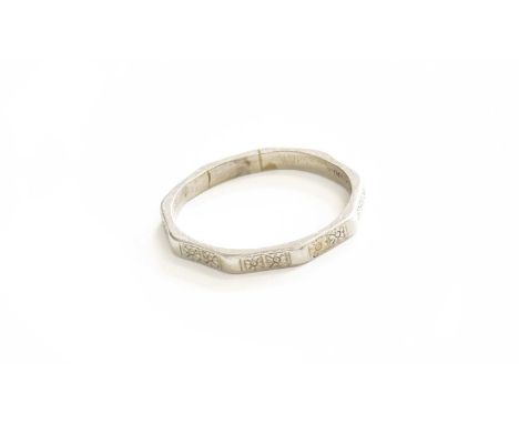 A Band Ring, stamped 'PLATINUM', finger size UGross weight 4.5 grams.