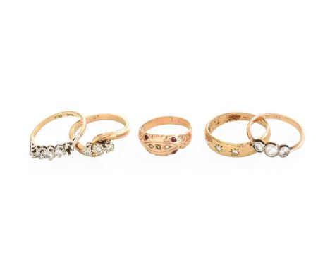 Two 9 Carat Gold Diamond Three Stone Ring, finger size N1/2 and R; A 9 Carat Gold Ruby and Split Pearl Ring, finger size K; a