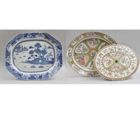 A Cantonese Porcelain Platter and Drainer, 19th century, of oval form, typically painted in famille rose enamels with figures