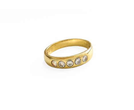 An 18 Carat Gold Diamond Five Stone Ring, the round brilliant cut diamonds inset in a yellow plain polished shank, total esti