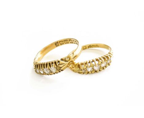 An 18 Carat Gold Diamond Five Stone Ring, the graduated old and brilliant cut diamonds in yellow claw settings, to a tapered 