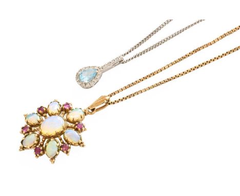 A Blue Topaz and Cubic Zirconia Pendant on A 9 Carat White Gold Chain, pendant length 1.9cm, chain length 46cm; and A 9 Carat