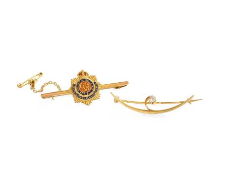A Diamond Crescent Brooch, pin stamped ‘15C’, length 4.3cm; and A Royal Army Service Corps Brooch, stamped ‘9CT’, length 4.5c