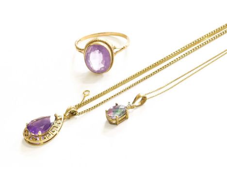 A 9 Carat Gold Amethyst Pendant on A 9 Carat Gold Chain, pendant length 2.3cm, chain length 46.5cm; A 9 Carat Gold Amethyst R