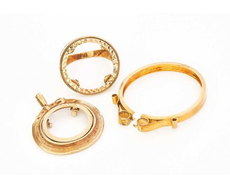 Three 9 Carat Gold Coin Mounts, comprising of a ring and two pendantsGross weight 13.7 grams.