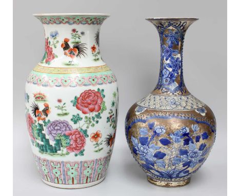 A Chinese Porcelain Vase, painted in famille rose enamels with cockerels in continuing landscapes, 36cm; together with a simi