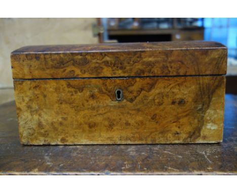 A 19TH CENTURY DOME TOP FIGURED WALNUT TEA CADDY with a satinwood interior, 25.5cm wide