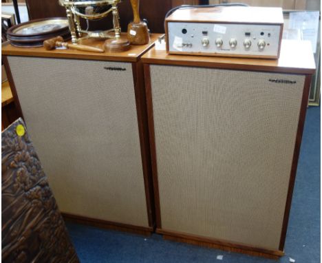A LARGE PAIR OF VINTAGE "TANNOY" SPEAKERS, in teak cases, each 84cm high x 55cm wide and a Rogers "Ravensbrook" amplifier in 