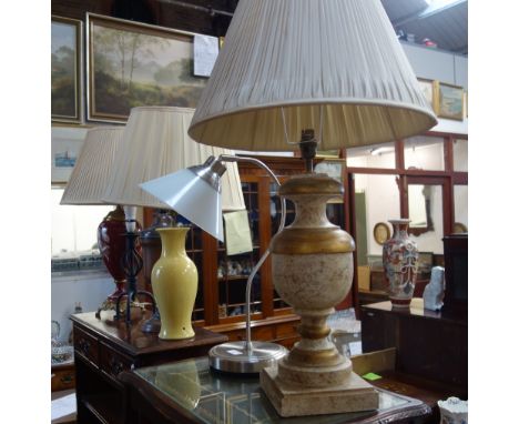 A BRASS MOUNTED RED CERAMIC TABLE LAMP with pleated shade and similar lamps