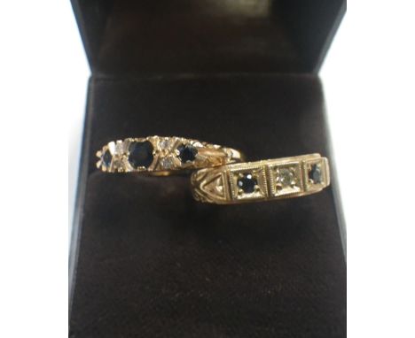 A SAPPHIRE AND DIAMOND GYPSY STYLE DRESS RING, ring size O and one other similar ring, ring size L (2)