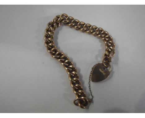 A 9CT YELLOW GOLD CHAIN LINK BRACELET with padlock clasp, c. 18gm 