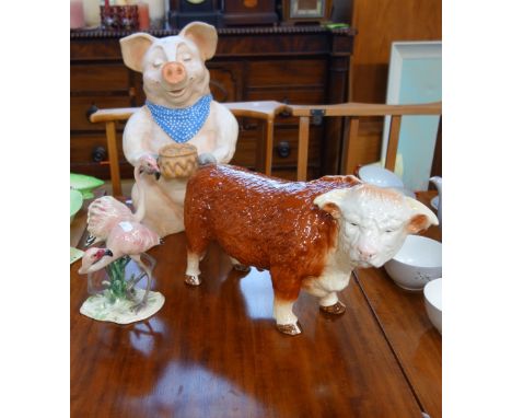 A LARGE MELBA WARE CERAMIC BUTCHER'S SHOP DISPLAY BULL, a Western German ceramic study of flamingos and a large resin pig wit