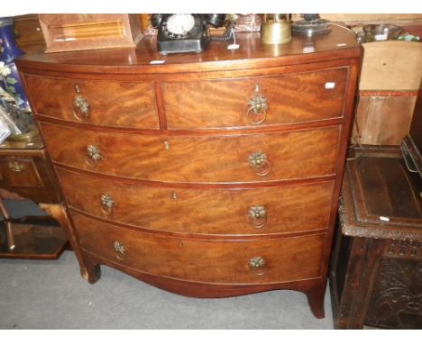 A 19TH CENTURY MAHOGANY BOWFRONT CHEST OF DRAWERS with brass ring handles, 107cm wide