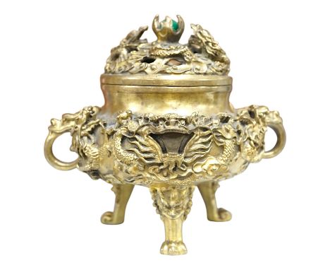 A Chinese bronze lidded censer, with jade bead insert in the finial, 15cm high. Condition - good.