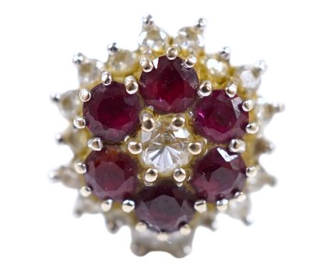 An 18ct white metal, ruby and diamond cluster ring, size P, gross weight 7 grams. Condition - fair