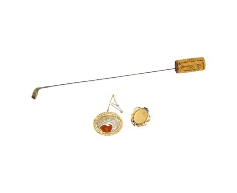 An early 20th century 9ct and gem set oval locket (lacking back?), 32mm, together with a silver mounted golf club hat pin and