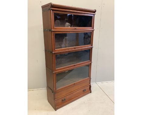 A Globe Wernicke mahogany four section bookcase, width 86cm, depth 31cm, height 165cm. Condition - fair