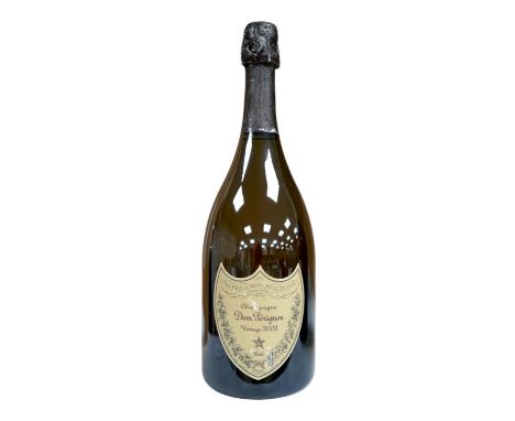 A 2003 vintage bottle of Dom Perignon champagne. Condition - fair to good, minor label wear, etc.