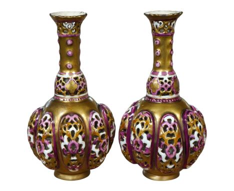 A pair of small Hungarian Zsolnay reticulated vases, 15cm high. Condition - good