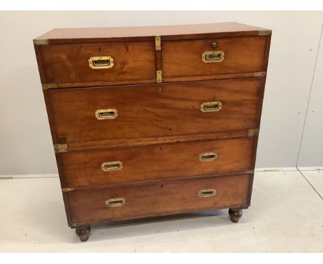 A late 19th century brass mounted mahogany two part military chest, width 99cm, depth 45cm, height 109cm. Condition - fair to