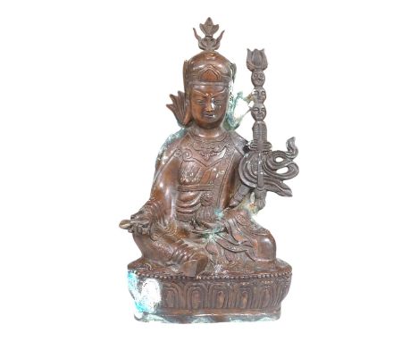 A Tibetan bronze Padmasambhava Buddhist figure, 29.5cm high. Condition - poor to fair.