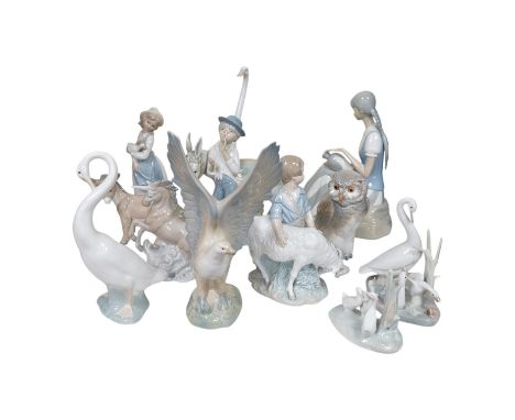 A quantity of Lladro style and Nao figures (12). Condition - good