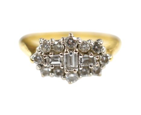 A modern 18ct gold and diamond cluster ring, size K, gross weight 4.4 grams. Condition - fair to good