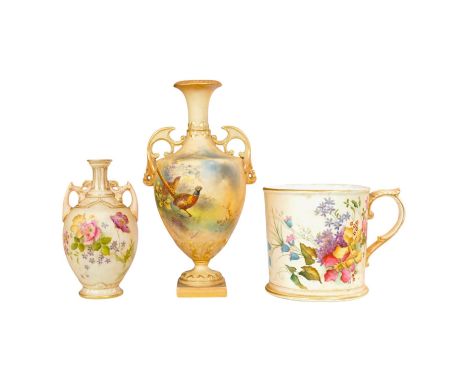 Three pieces of Royal Worcester; a mug, 11.5cm high, and two vases, tallest 22.5cm. Condition - good.
