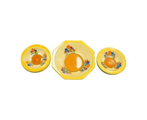 A Clarice Cliff Crocus pattern octagonal bowl and set of six dishes, largest 23cm wide. Condition - good
