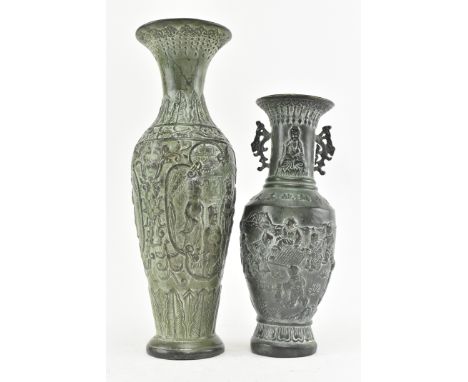 A pair of Chinese bronzed vases, each with relief design. Comprising a baluster vase with twin handles, character surround to