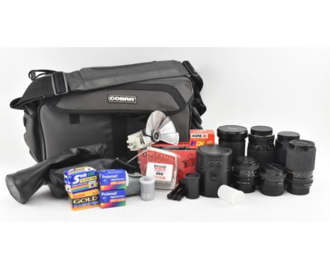 A collection of vintage camera lenses &amp; accessories. The lot comprising Sigma Zoom lens 1:4 5.6, Sigma UC Zoom 24-50mm 1: