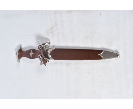 A WWII ERA GERMAN SA DAGGER, this dagger is complete with its original scabbard and has the maker mark of RZM M7/2 and was ma