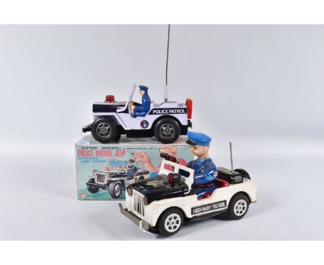 A BOXED NOMURA TN TOYS BATTERY OPERATED TINPLATE STICK SHIFT POLICE JEEP, No.7507, not tested, appears complete and in good c