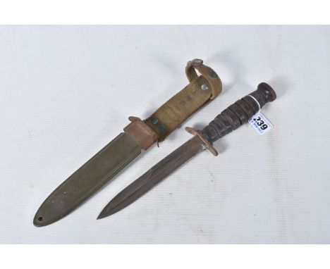 A US ARMY FIGHTING KNIFE, the blade is clearly marked 'U.S.M3 PAL' but has no date, the scabbard and frog appear to be origin