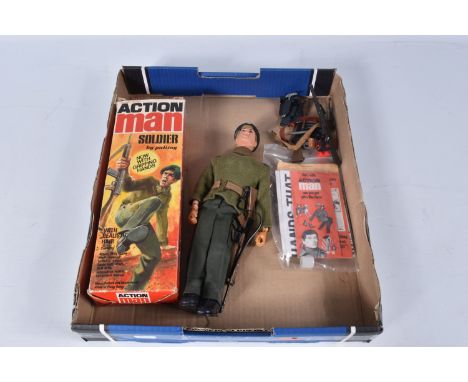 A BOXED PALITOY ACTION MAN SOLDIER FIGURE, No.34052, figure with fair flock hair and gripping hands which have some discolour