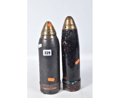 TWO TRENCH ART MISSILES WITH FUSES, the first measures approximately 7cm in diameter and approximately 80cm in height, the se