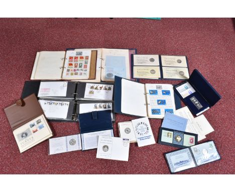 COLLECTION OF STAMPS AND FIRST DAY COVERS, main value in eight silver medallic covers/sets