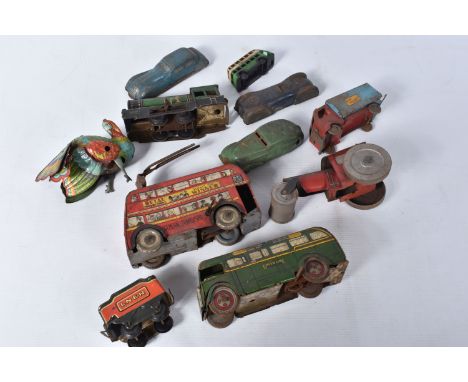 A QUANTITY OF ASSORTED TINPLATE TOYS, to include clockwork Betal Trolleybus, clockwork Wells Brimtoy Green Line Coach,  Betal