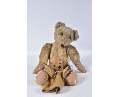 A GERMAN BLONDE MOHAIR TEDDY BEAR, c.1914 - 1920, original glued amber and black glass eyes (both with damage), vertical stit