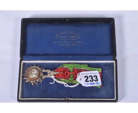 A THAILAND ORDER OF THE WHITE ELEPHANT MEDAL, with ribbon rosette, this award is 5th class and comes in the box that is not o